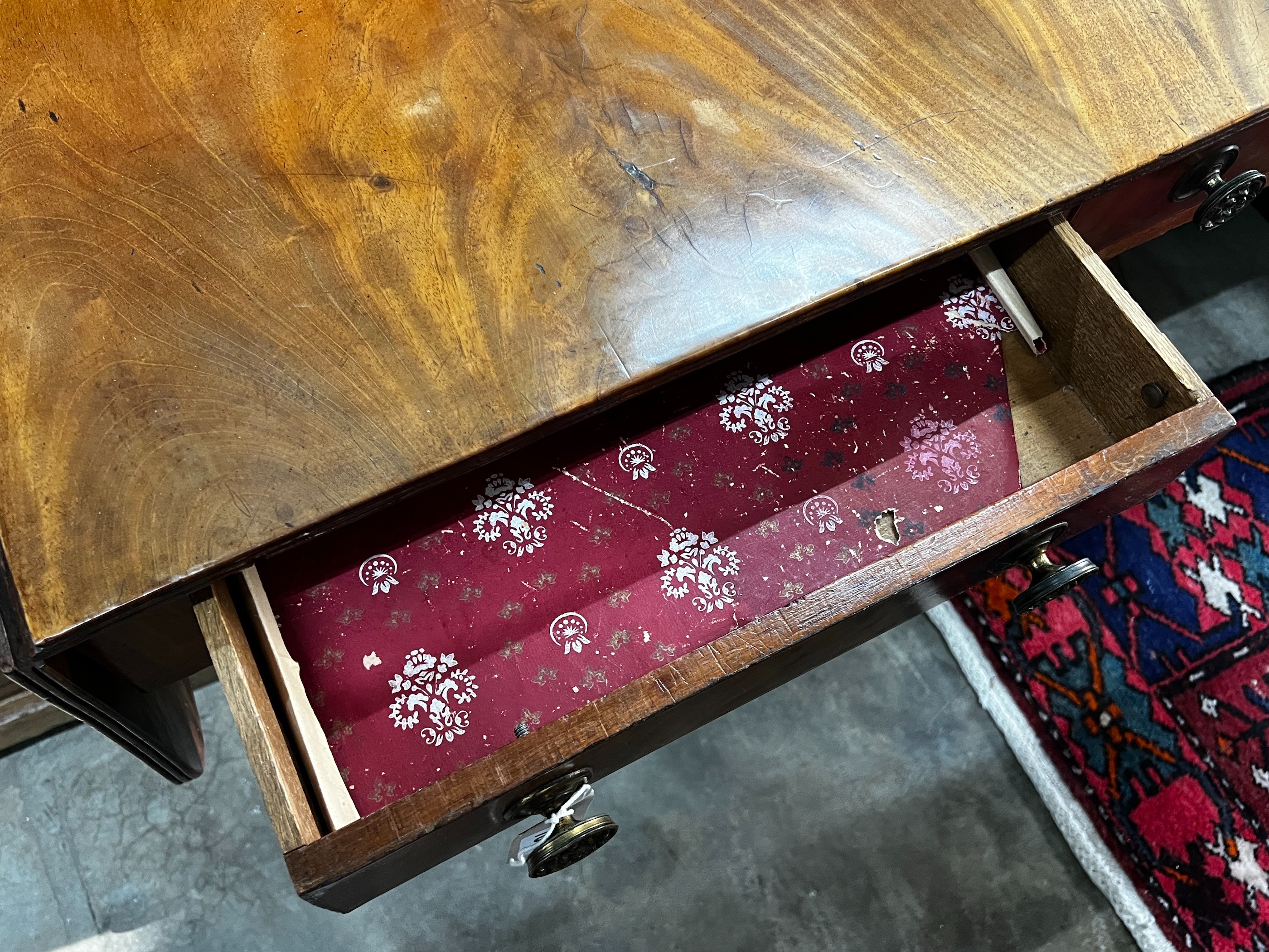 A Regency mahogany sofa table, width 99cm, depth 71cm, height 70cm